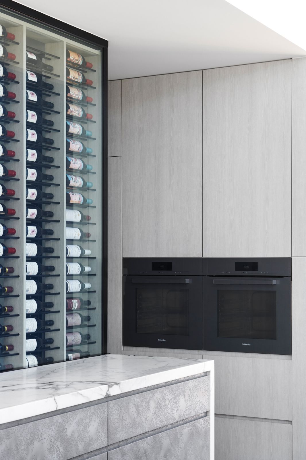 Brighton, Beach Road kitchen with a glass wine wall beside the ovens