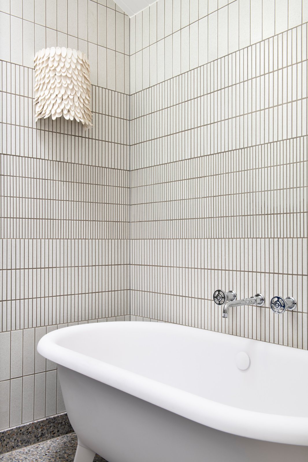 Mornington Beach House bathroom with vertical tiles and a freestanding bath