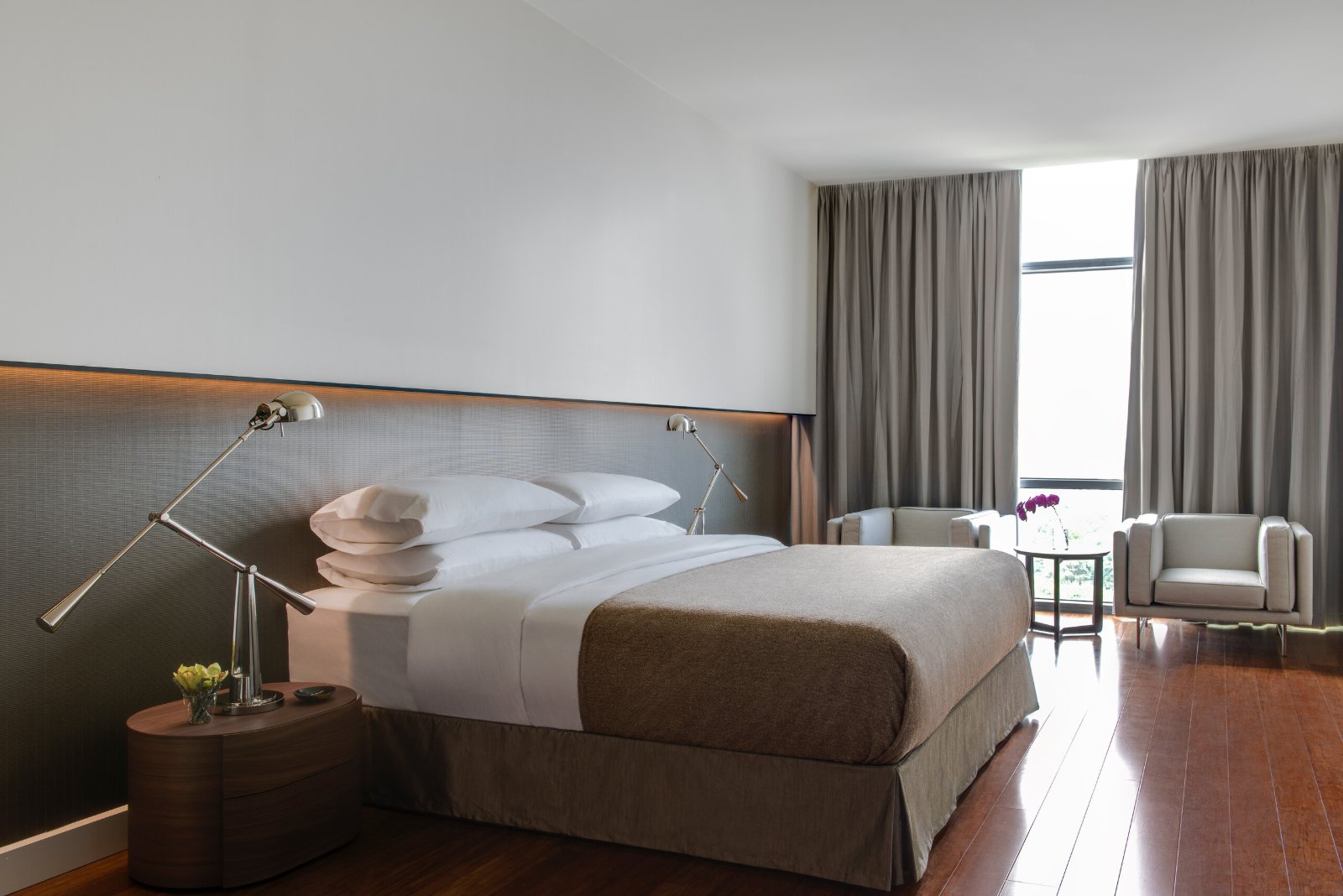 Southbank Pied-à-Terre bedroom with grey curtains at the windows